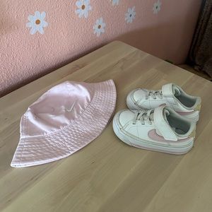 Nike shoes and sun hat